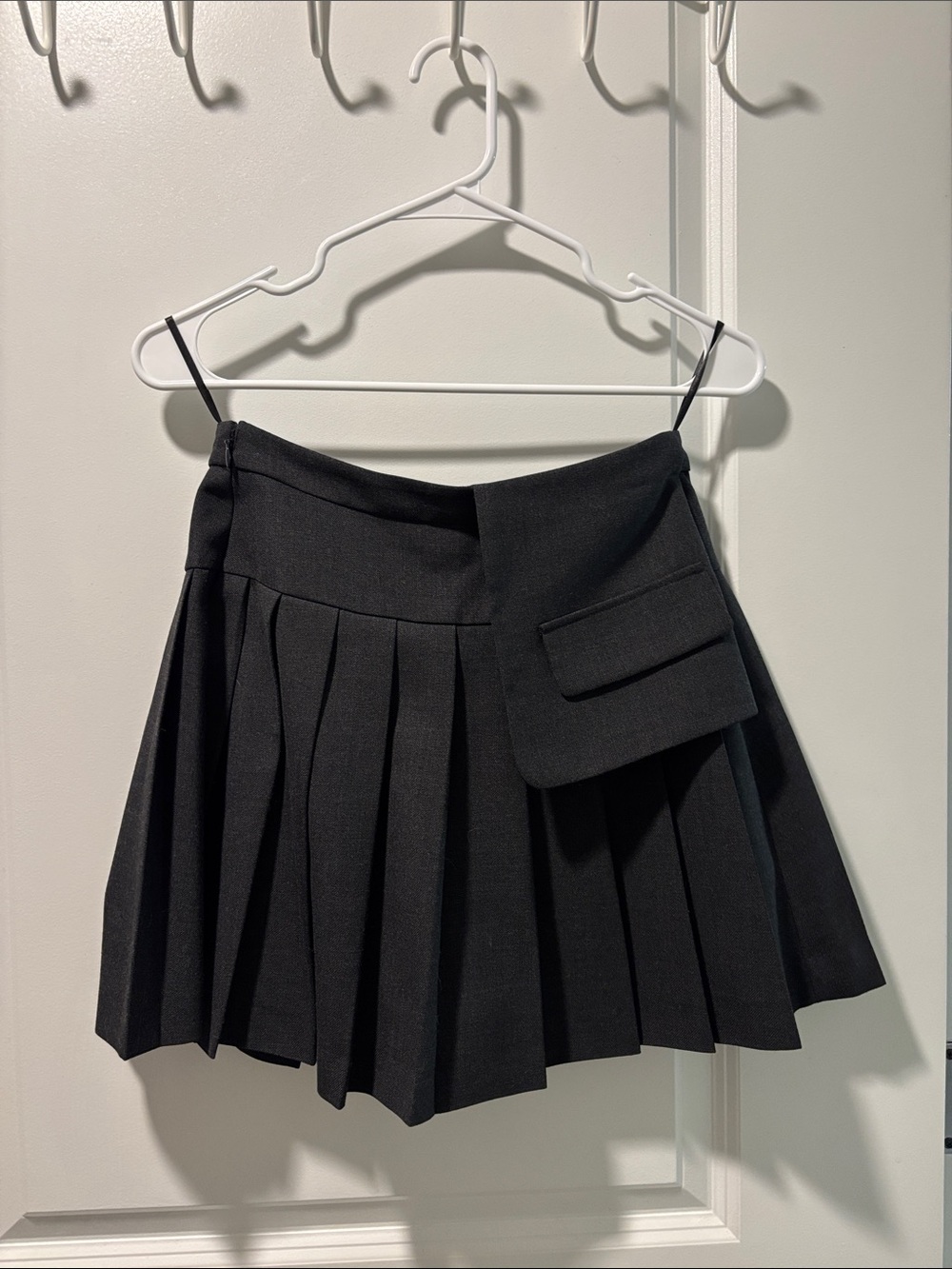 Mo&Co Black Pleated Mini Skirt with Side Flap